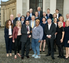 American tourist photobombs the NRF fellows photo!